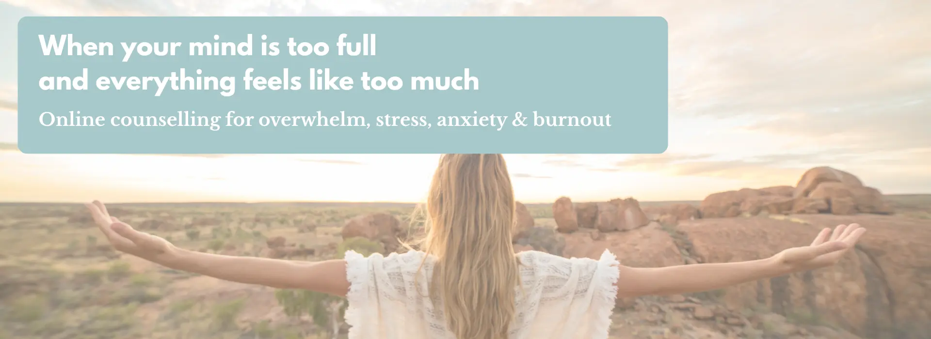 Woman standing peacefully outdoors with arms stretched wide, representing support for overwhelm, stress and anxiety