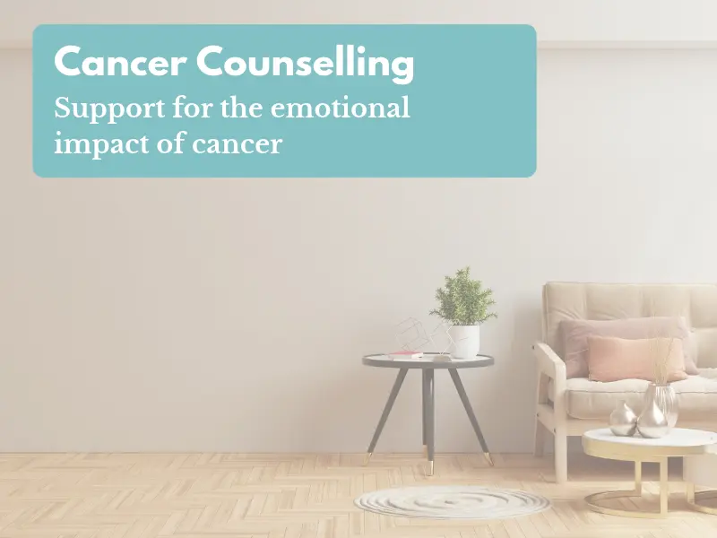 A cosy sofa with soft cushions in a warm, neutral-toned room, creating a calm and inviting space